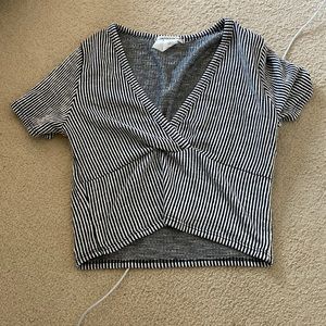 Caution to the wind vneck